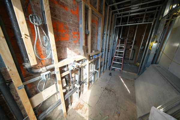 Interior plumbing pipes and construction framing